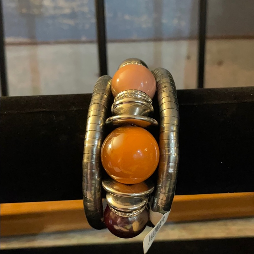 Costume jewelry coil bracelet.  Adjustable size